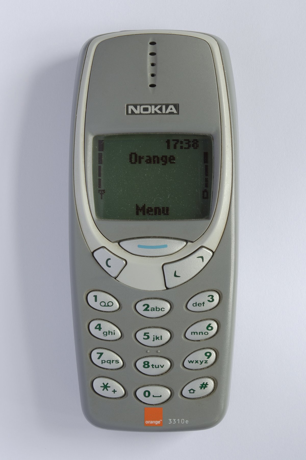 A grey Nokia 3310 mobile phone