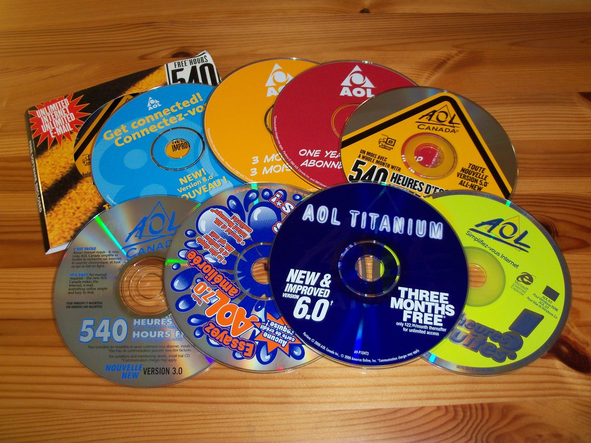 A pile of AOL promotional trial CDs